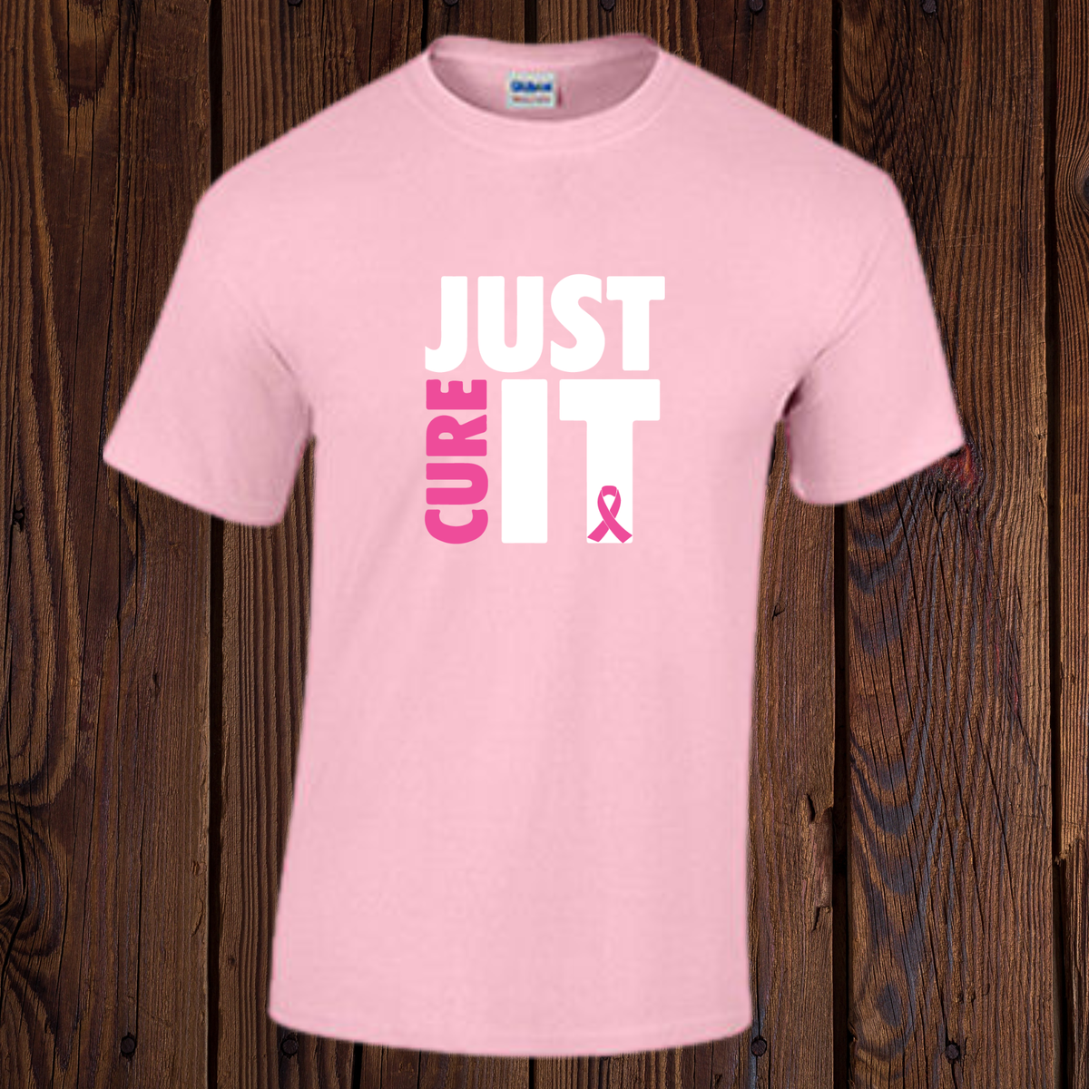 Light pink Breast Cancer Awareness T-shirt with white Just Cure It lettering and pink ribbon